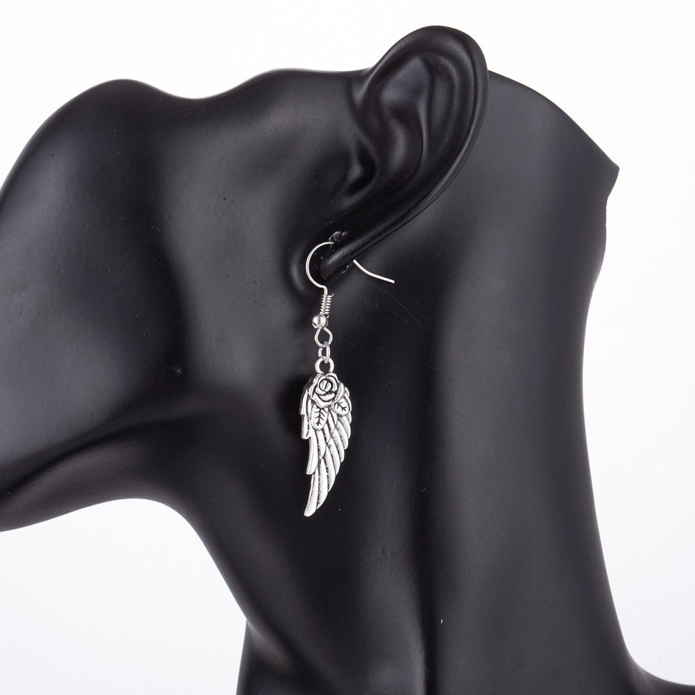 Valentina Abyss - The Nevermore Gothic Earrings Rose in Angel Wings – Unique Earrings by Nevermore Lifestyle & Tech | 4stylr