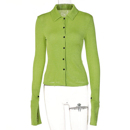 A polyester shirt in shades of black, green and white with long sleeves. It comes in 3 sizes S, M and L.