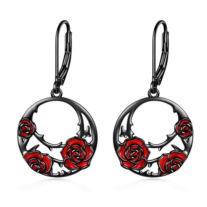 The earrings are made from high-quality sterling silver, which ensures that they will last for a long time and maintain their shine and beauty. The red rose design is intricately detailed and adds a touch of elegance to the overall gothic look of the earrings.