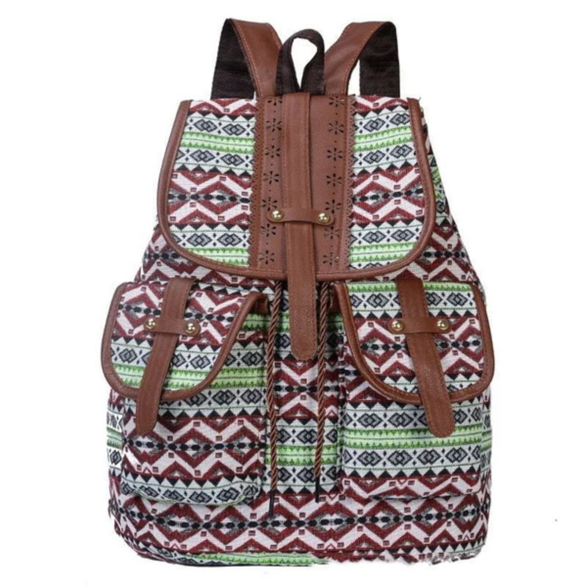 Backpack with tribal pattern and brown straps on a white background