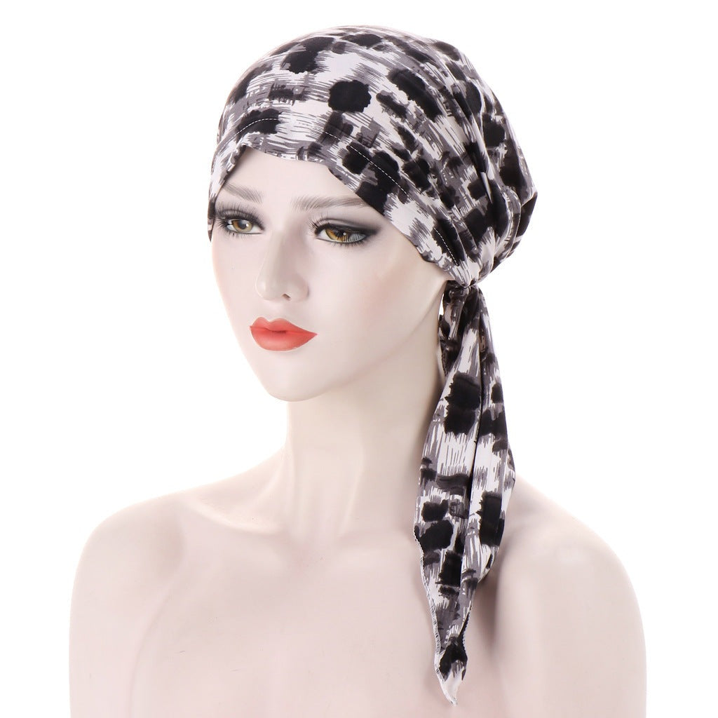 The Red Brook - The Nevermore Boho Headscarf is a beautiful piece of accessory that is perfect for those who love to add a touch of elegance to their outfits. Made with high-quality materials, this headscarf is designed to be soft and comfortable against the skin, making it perfect for everyday wear.