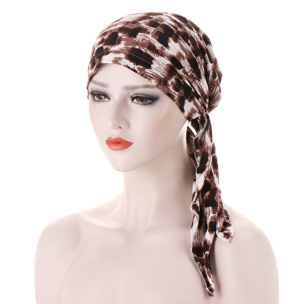 The Red Brook - The Nevermore Boho Headscarf is a beautiful piece of accessory that is perfect for those who love to add a touch of elegance to their outfits. Made with high-quality materials, this headscarf is designed to be soft and comfortable against the skin, making it perfect for everyday wear.