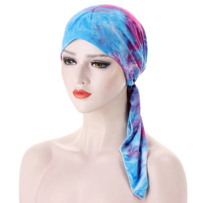 The Red Brook - The Nevermore Boho Headscarf is a beautiful piece of accessory that is perfect for those who love to add a touch of elegance to their outfits. Made with high-quality materials, this headscarf is designed to be soft and comfortable against the skin, making it perfect for everyday wear.