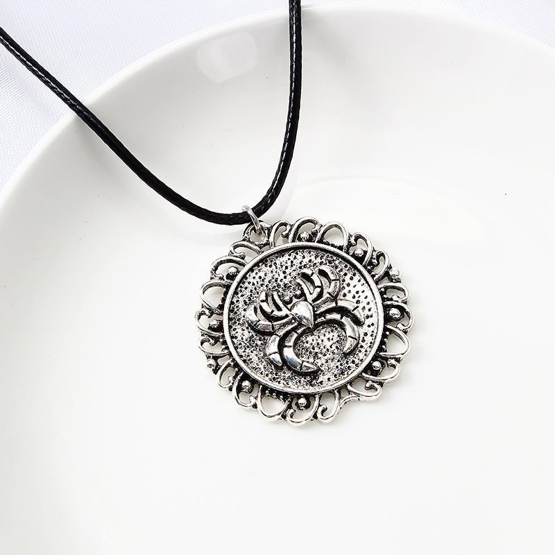 Ainsley Dunmore - Gothic Spider Circle Pendant by The Nevermore – Unique Gothic Jewelry by Nevermore Lifestyle & Tech | I