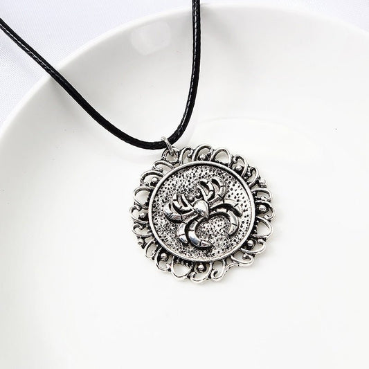Ainsley Dunmore - Gothic Spider Circle Pendant by The Nevermore – Unique Gothic Jewelry by Nevermore Lifestyle & Tech | I