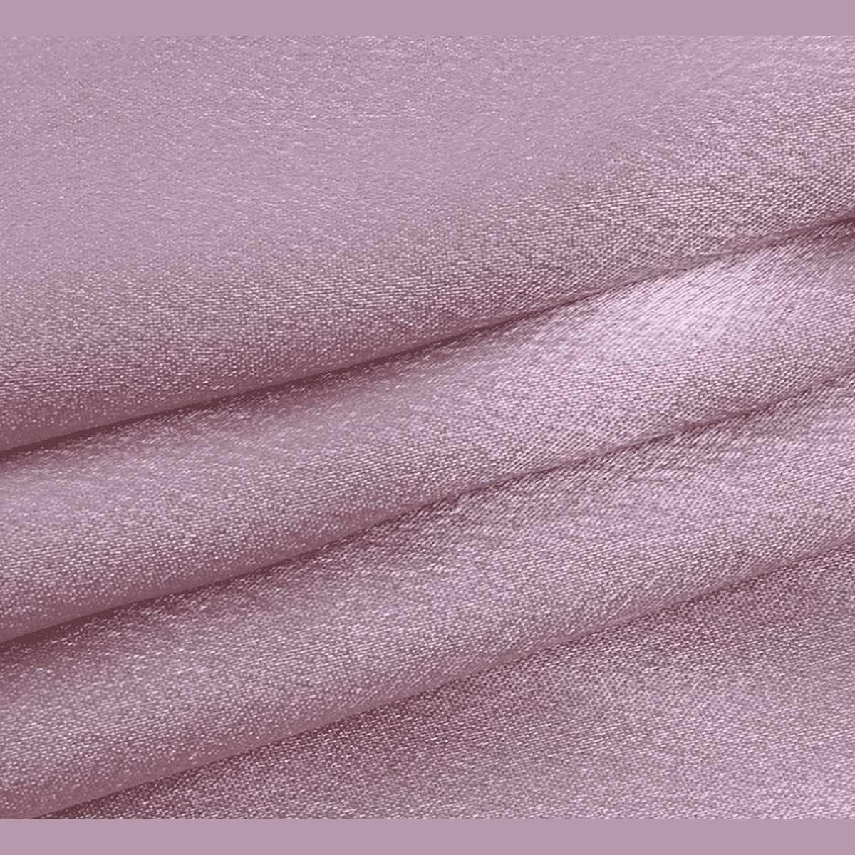 Close-up of the pink satin fabric of the Amari Combs dress.