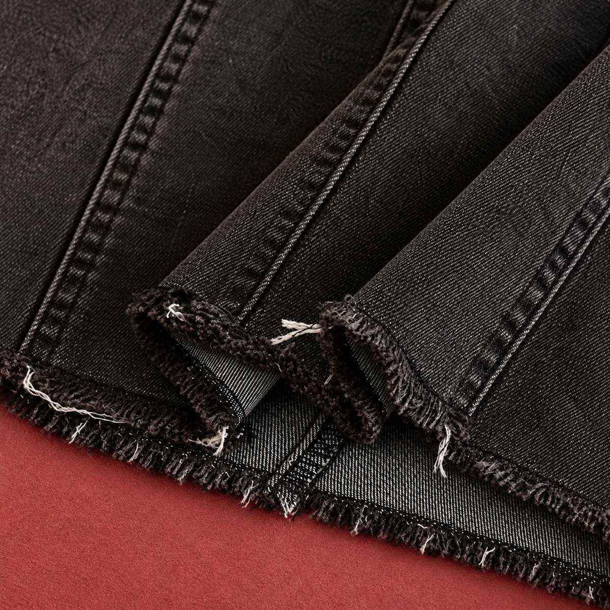 Azure Spine black denim mini dress straight frayed hem detail