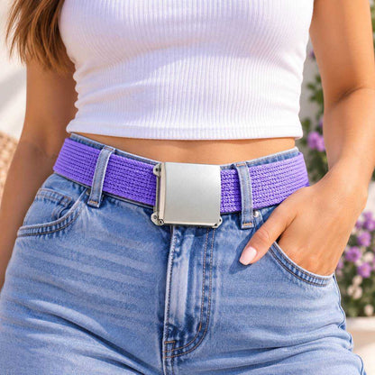 Purple woven belt with a silver buckle, worn with a white top and blue jeans.