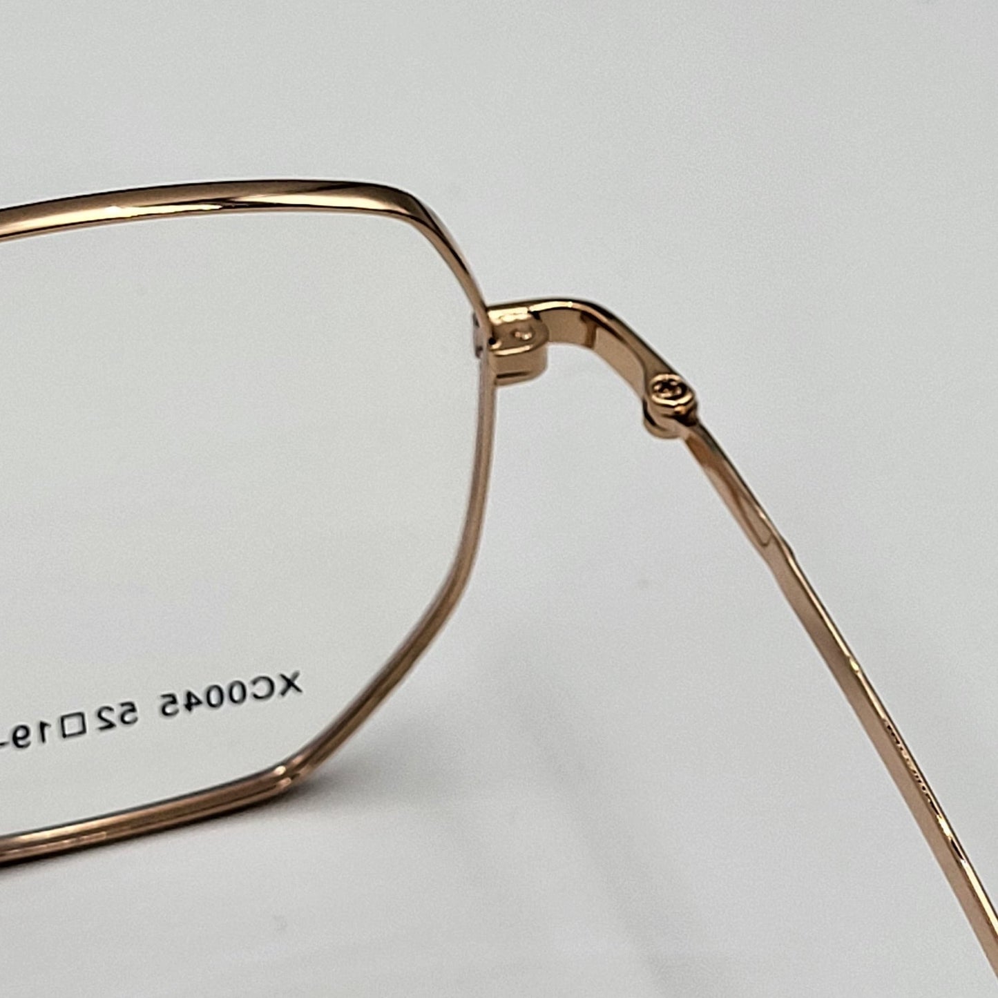 G - OTTICA XC0045 - Sleek Gold Black Eyeglasses by The Nevermore – Unique Eyeglasses by Nevermore Lifestyle & Tech |