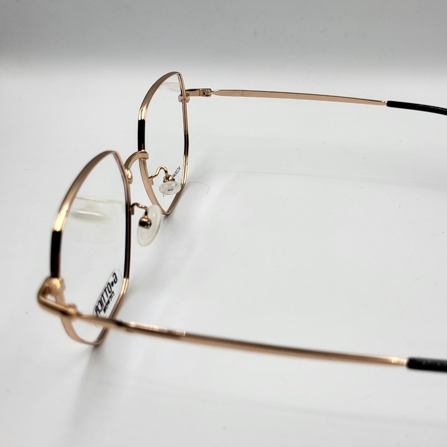 G - OTTICA XC0045 - Sleek Gold Black Eyeglasses by The Nevermore – Unique Eyeglasses by Nevermore Lifestyle & Tech |