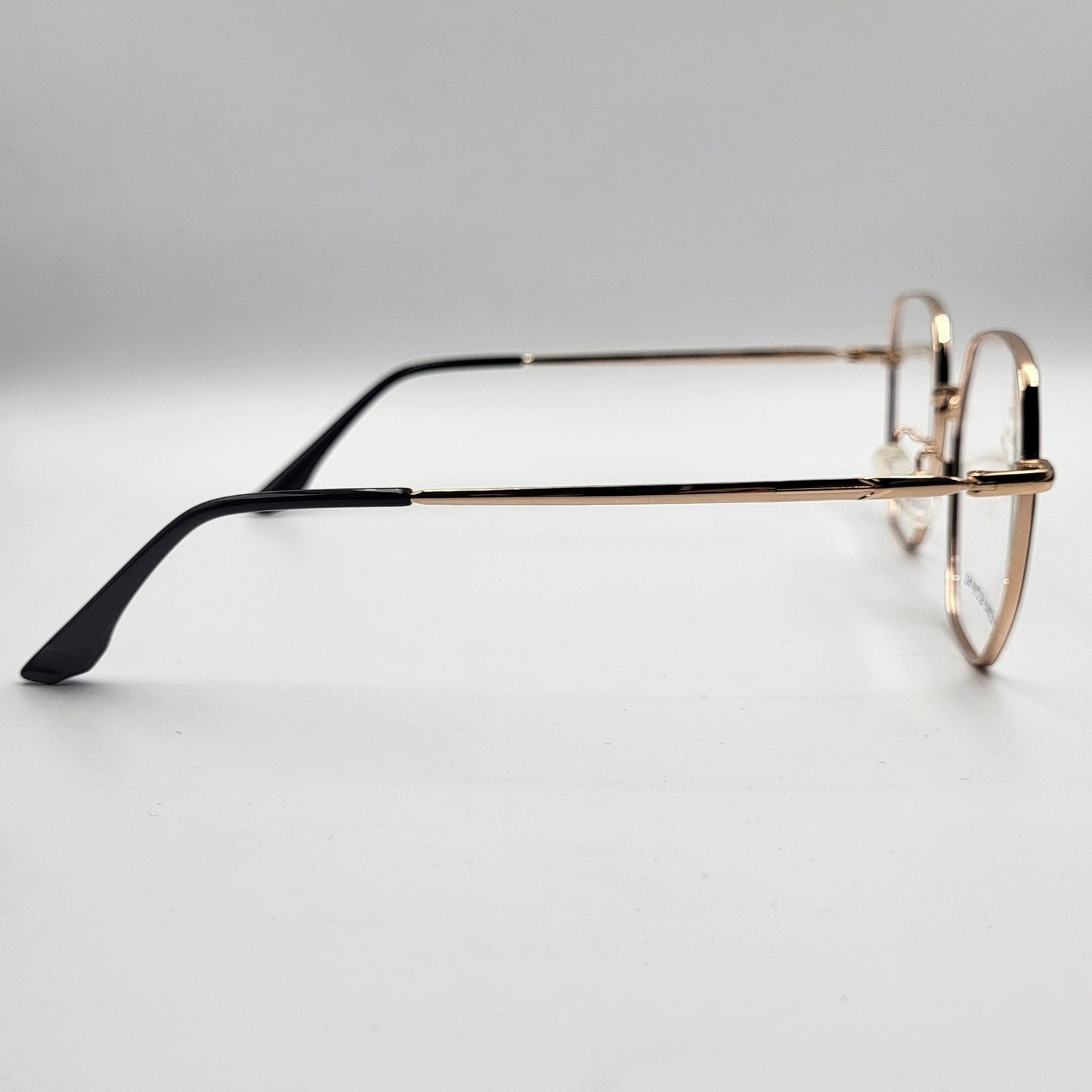 G - OTTICA XC0045 - Sleek Gold Black Eyeglasses by The Nevermore – Unique Eyeglasses by Nevermore Lifestyle & Tech |