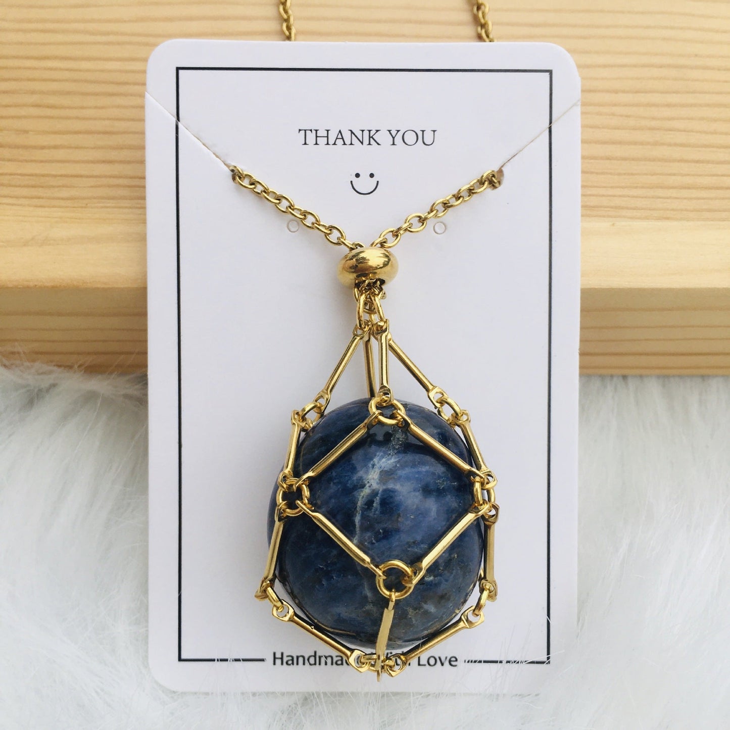 Ivory Elegance - The Nevermore Natural Crystal Pendant – Unique Jewelry by Nevermore Lifestyle & Tech | Golden Blue Pattern