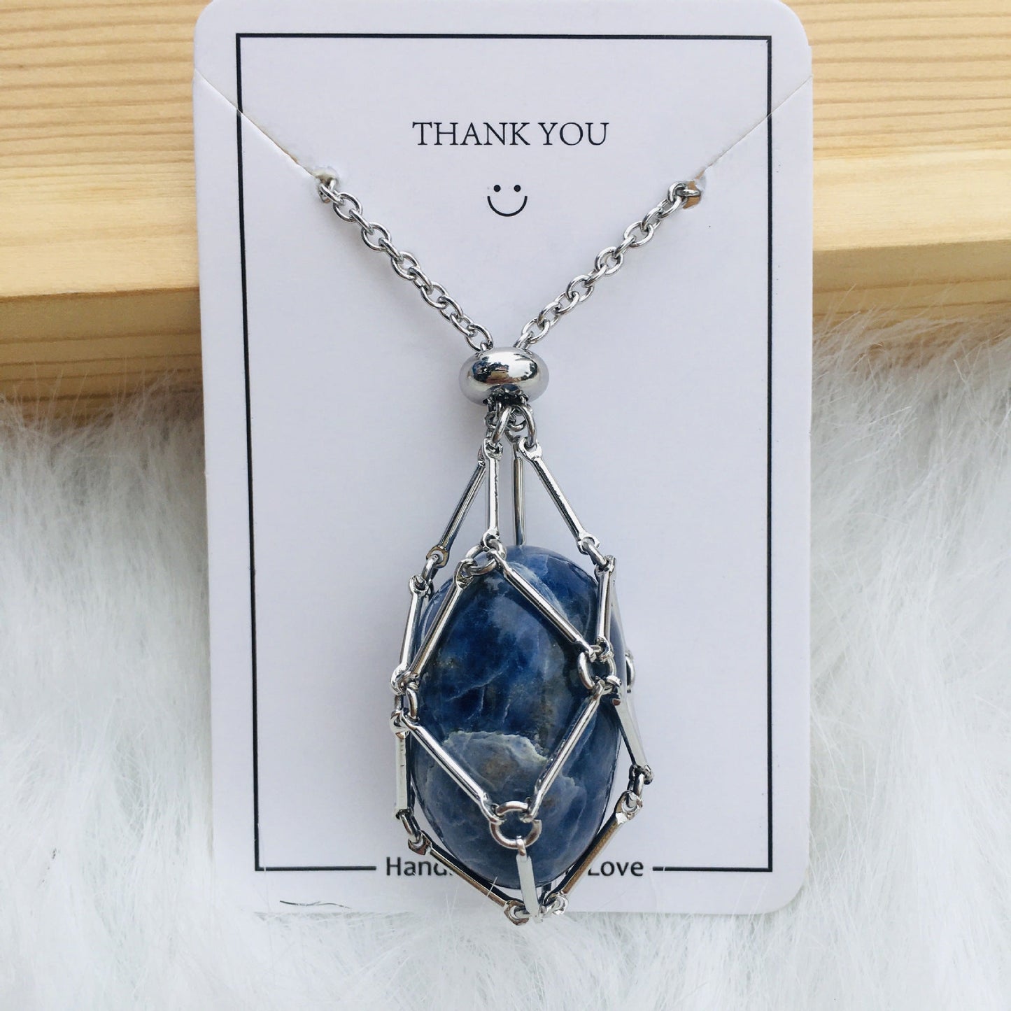Ivory Elegance - The Nevermore Natural Crystal Pendant – Unique Jewelry by Nevermore Lifestyle & Tech | Silver Blue Pattern