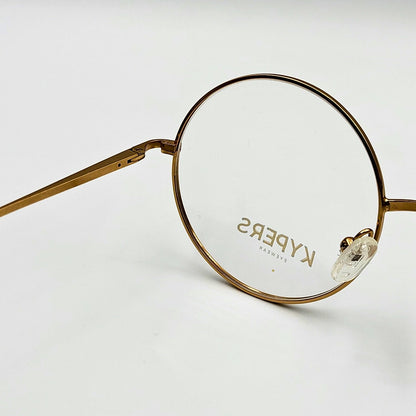Kypers NORA - Gold Round Eyeglasses by The Nevermore – Unique Eyeglasses by Nevermore Lifestyle & Tech |