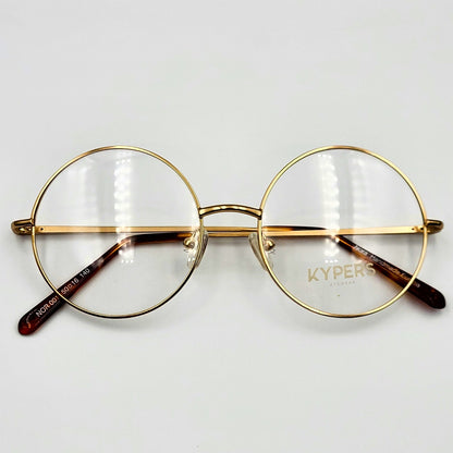 Kypers NORA - Gold Round Eyeglasses by The Nevermore – Unique Eyeglasses by Nevermore Lifestyle & Tech |