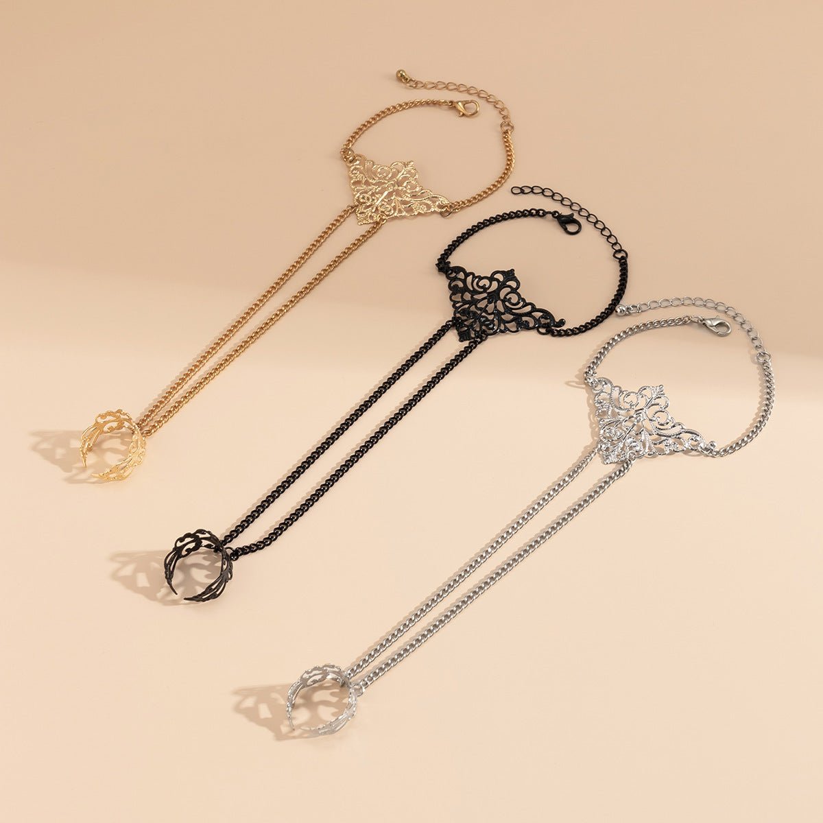 Shadowmourn – Gothic Crown Finger Bracelet by The Nevermore – Unique Accessories by Nevermore Lifestyle & Tech | Black2021